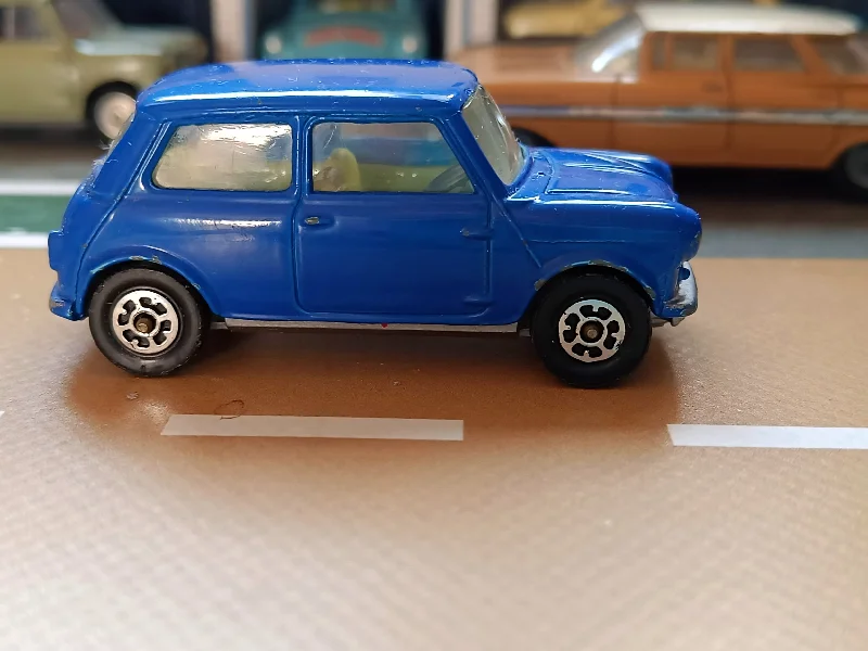 Remote - Controlled High - Speed Off - Road Buggy with All - Terrain Tires and Suspension204 Morris Mini Minor in mid-blue with silver base Whizzwheels (3)